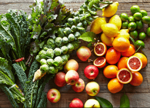 a group of fruits and vegetables on a wood surface Healthy Weight Loss Diets Thrapston